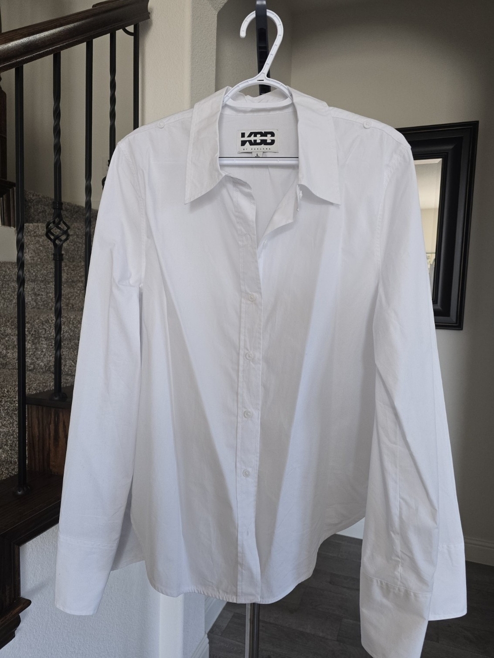 Kahlana white button-down shirt in size L